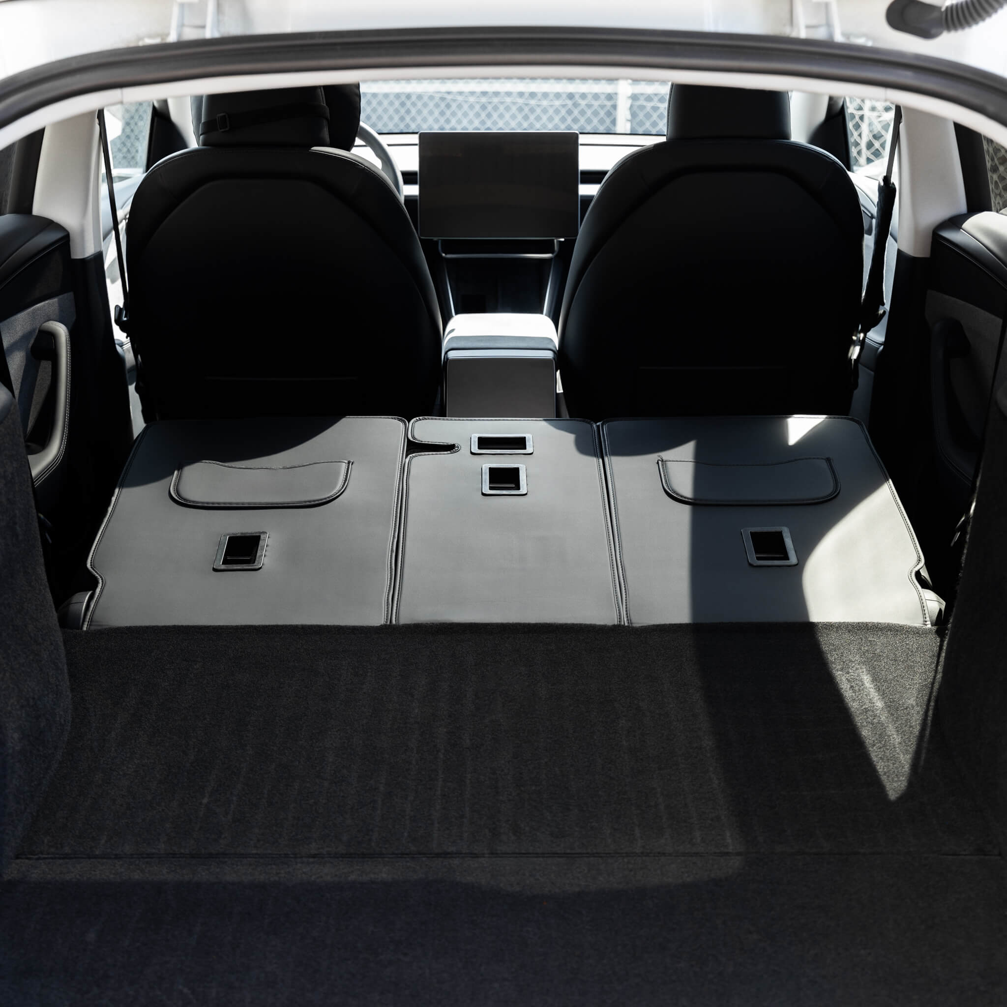 Tesla Model Y: stoelbescherming voor de achterbank