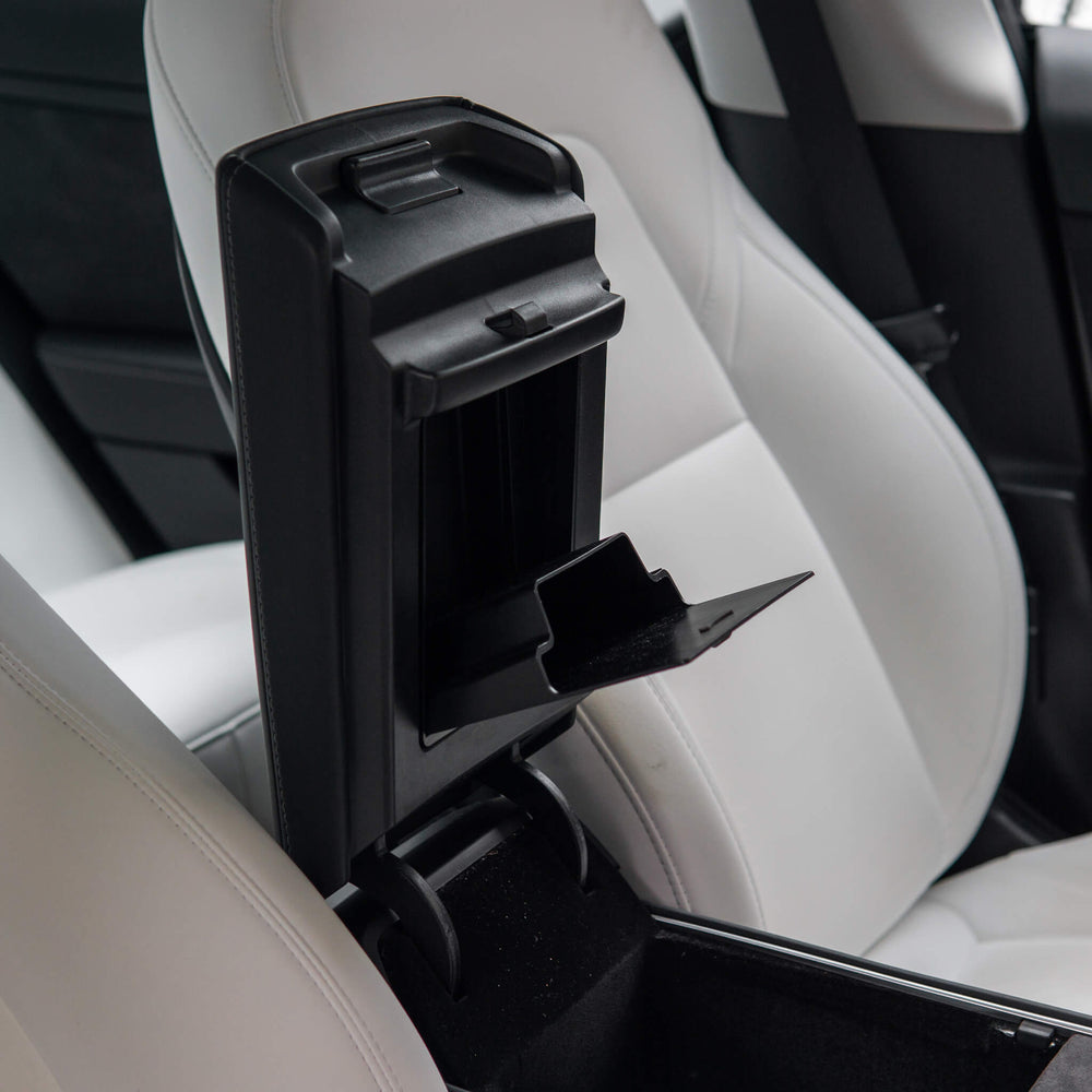 Tesla Model 3/Y: Secret compartment for the armrest