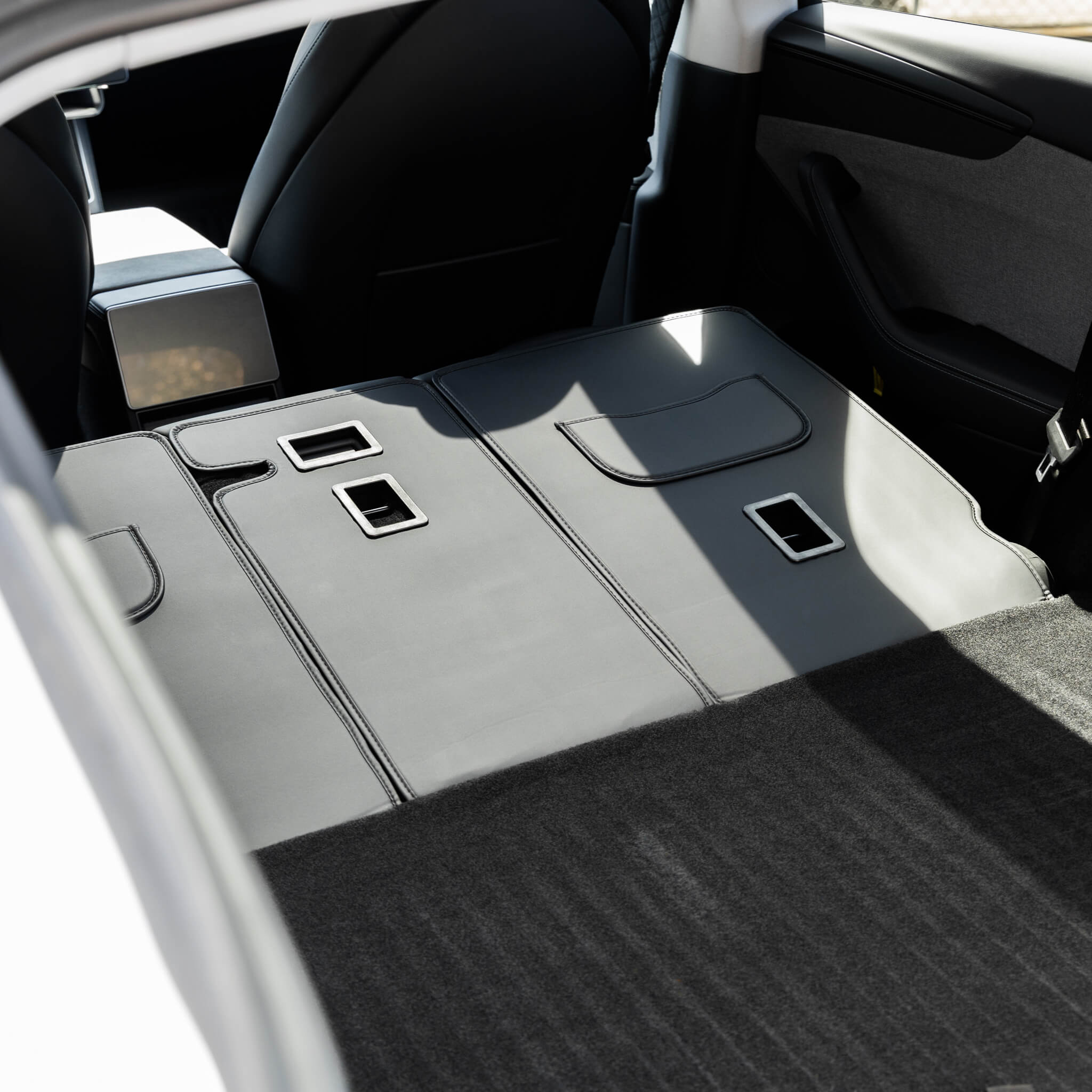 Tesla Model Y: stoelbescherming voor de achterbank